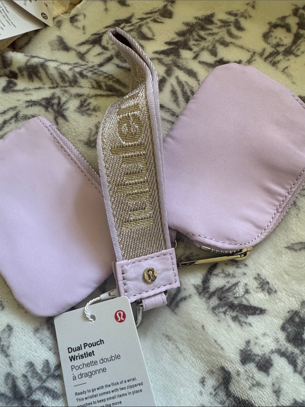 lululemon athletica Dual Pouch Wristlet in Pale Pink with Gold Logo Strap